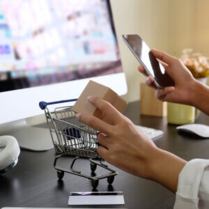 cropped shot shopping online with woman using device technology - marketingmedia